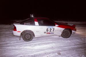 The Marcin Kowalski / Marek Cichocki Mitsubishi Eclipse drifts through the first corner of the second running of the ranch stage