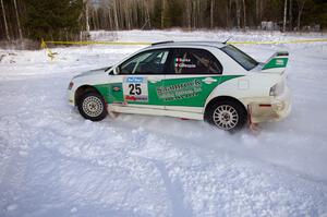 Seamus Burke / Jason Gillespie Mitsubishi Evo 8 tries to chase the Richards' Subaru only to crash later in the stage.