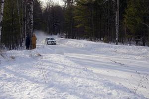 Matt Iorio / Ole Holter	Subaru Impreza at speed at sunrise on the first stage of day two.