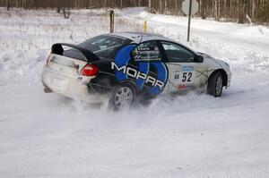Doug Shepherd / Bob Martin Dodge SRT-4 on a left-hander on the first stage of day two.