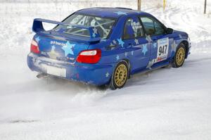 William Bacon / Peter Watt Subaru WRX STi at a 90-left on the first stage of day two.