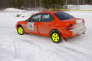Adam Boullion / Phil Boullion Dodge Neon exits out of a left-hander on day two of the rally.