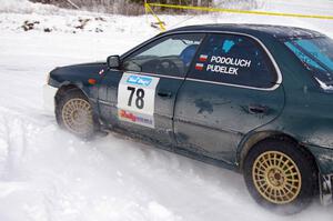 Mark Podoluch / Kazimierz Pudelek Subaru Impreza exit out of a tight left-hander on day two of the rally.