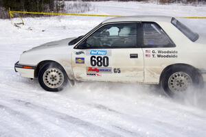 Greg Woodside / Tom Woodside set their Dodge Shadow into a nice drift.