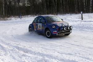 Mike Halley / Kala Rounds VW New Beetle exit a 90-left on the first stage of day two of the rally.