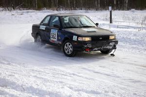 Brian Dondlinger / Dave Parps exit a 90-left on the first stage of day two in their Nissan Sentra SE-R.