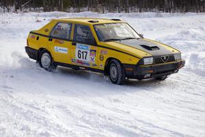 Eric Mozer / Jay Efting Alfa Romeo Milano at a 90-left on the first stage of day two.