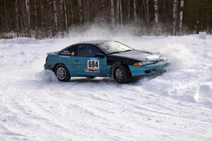 Adam Markut / John Nordlie Eagle Talon clip the inside of a bank on the first stage of day one.