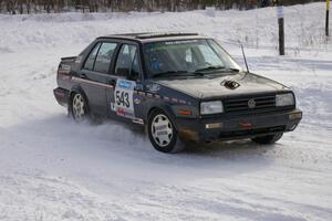 Mike Merbach / Jeff Feldt VW Jetta at a 90-left on the first stage of day two.
