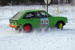 Karen Purzycki / Bob Pierce take a much easier approach to a slick corner in their Ford Fiesta.