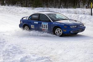 Dan Adamson / Jason Takkunen Saturn SL2 at a 90-left on day two of the rally.