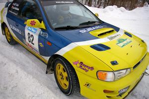 Joan Hoskinson / Jeff Secor Subaru Impreza 2.5RS hugs the inside of a bank on day two of the rally.