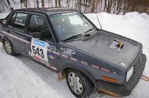 Mike Merbach / Jeff Feldt VW Jetta get close to the inside bank on a 90-right on day two.