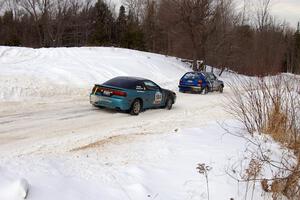 Adam Markut / John Nordlie Eagle Talon passes the Russ Rosendale / Pete Oppelt VW Golf on a straight just after a 90-right.