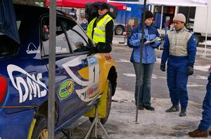 Pat Richard is interviewed in front of the Subaru WRX STi that he and his sister Nathalie Richard were winning in.