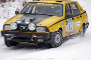 Eric Mozer / Jay Efting Alfa Romeo Milano at dusk near the end of day two of the rally.