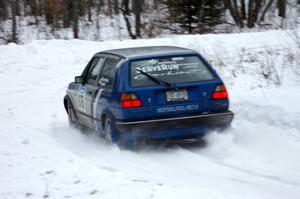 Russ Rosendale / Pete Oppelt VW Golf at a sharp hairpin right on day two of the rally.