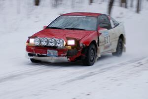 Marcin Kowalski / Marek Cichocki on a straight at dusk in their Mitsubishi Eclipse.