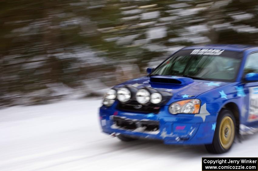 William Bacon / Peter Watt Subaru WRX STi at speed on a straight on the ranch stage.