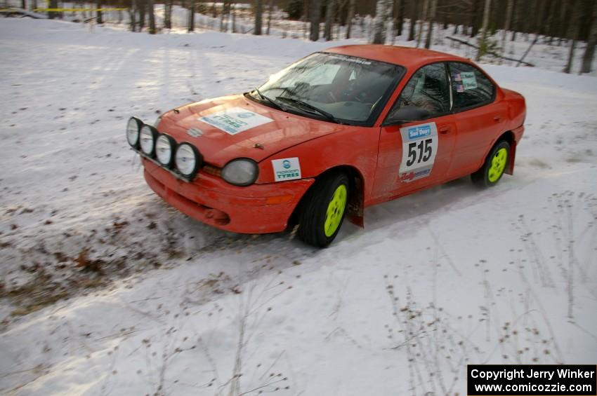 Adam Boullion / Phil Boullion Dodge Neon on the ranch stage on day one of the rally.