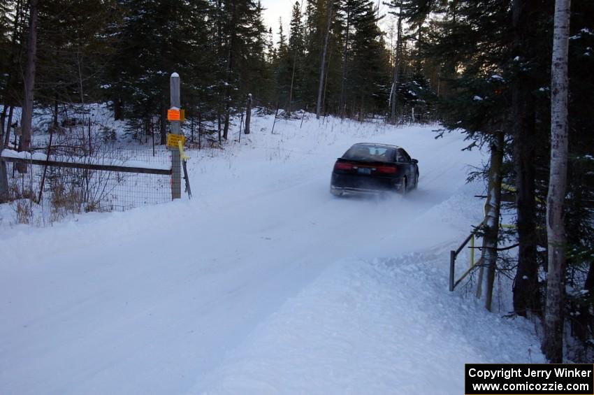 Larry Parker / Ray Summers lost time stuck in a snow bank during the early stages of day one in their Eagle Talon.