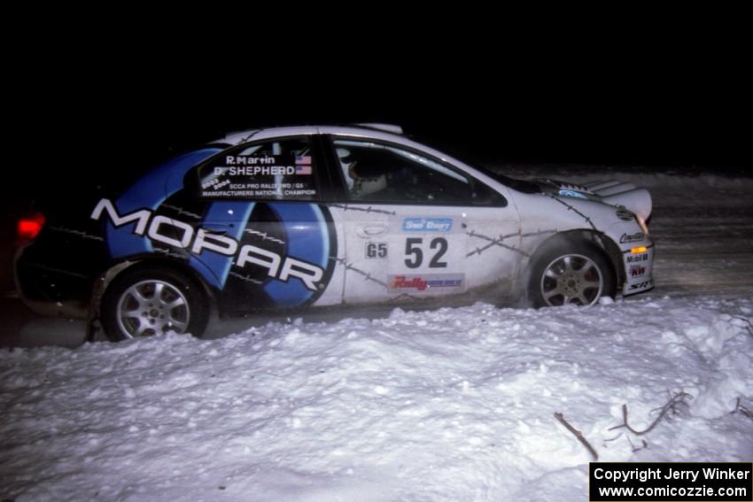 Doug Shepherd / Bob Martin blast down a straight in their Dodge SRT-4 on the second running of the ranch stage.