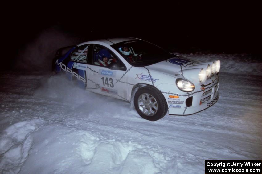 The Chris Whiteman / Mike Rossey Dodge SRT-4 drifts through the first corner of the evening running of the ranch stage.