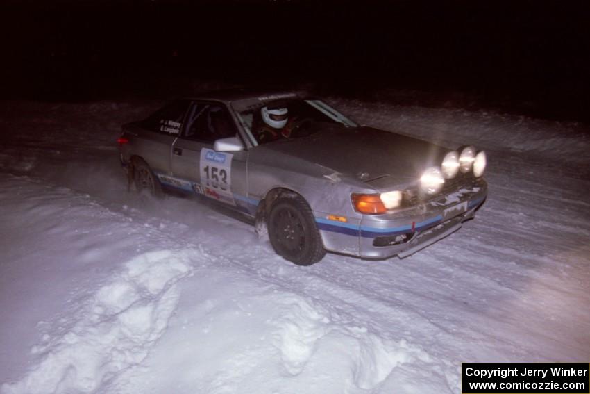 The Eric Langbein / Jeremy Wimpey Toyota All-Trac drifts through the first corner of the evening running of the ranch stage.