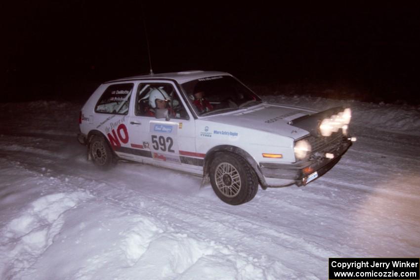 The Justin Pritchard / Kim DeMotte VW Golf drifts through the first corner of the evening running of the ranch stage.