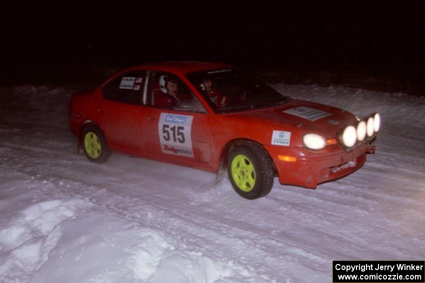 The Bruce Davis / Jimmy Brandt Dodge SRT-4 drifts through the first corner of the evening running of the ranch stage.