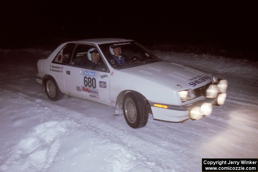 The Greg Woodside / Tom Woodside Dodge Shadow drifts through the first corner of the evening running of the ranch stage.