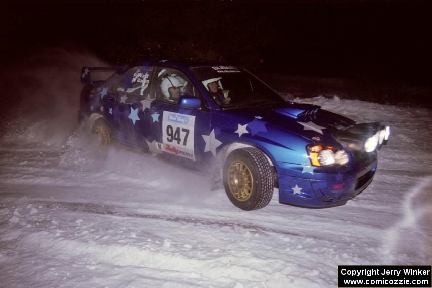 The William Bacon / Peter Watt Subaru WRX STi drifts through the first corner of the evening running of the ranch stage.