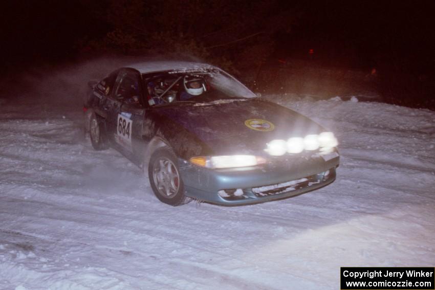 The Adam Markut / John Nordlie Eagle Talon drifts through the first corner of the evening running of the ranch stage.