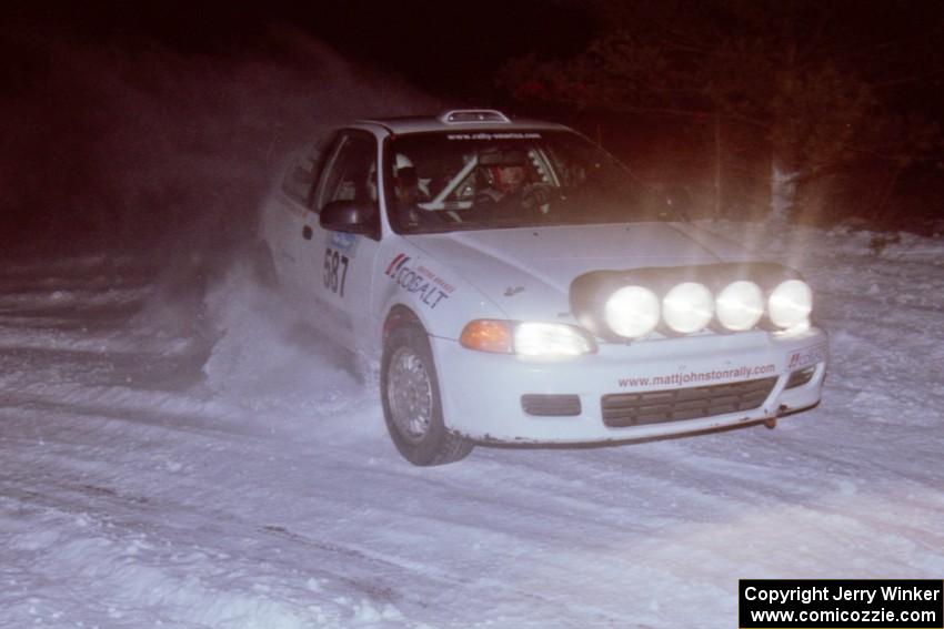 The Matt Johnston / Alex Kihurani Honda Civic drifts through the first corner of the evening running of the ranch stage.