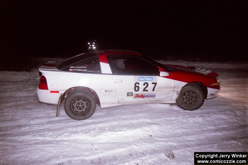 The Marcin Kowalski / Marek Cichocki Mitsubishi Eclipse drifts through the first corner of the second running of the ranch stage