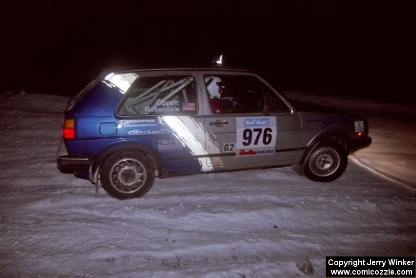 The Russ Rosendale / Pete Oppelt VW Golf drifts through the first corner of the evening running of the ranch stage.