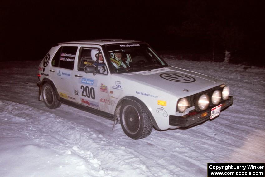 The Brett Fairbanks / Chris Greenhouse VW Rabbit drifts through the first corner of the evening running of the ranch stage.