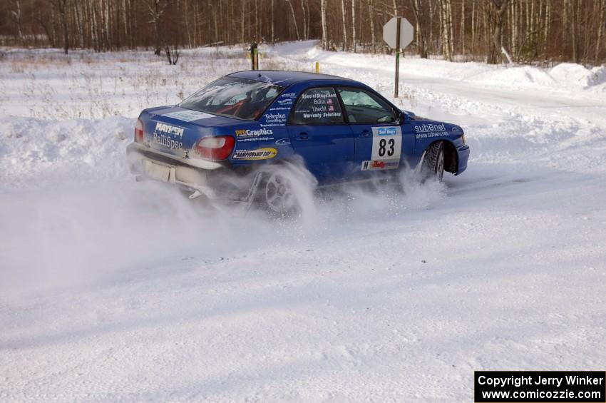 Mark Utecht / Rob Bohn prepare for a 90-left on the first stage of day two in their Subaru WRX.