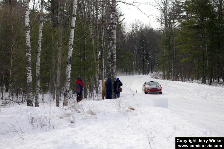 Cary Kendall / Scott Friberg Eagle Talon rockets past a few spectators on the first stage of day two of the rally.