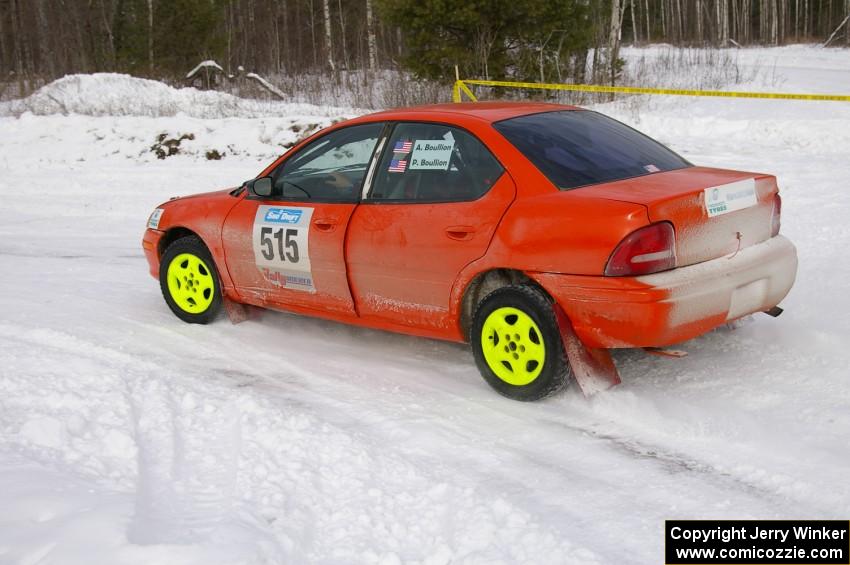 Adam Boullion / Phil Boullion Dodge Neon exits out of a left-hander on day two of the rally.