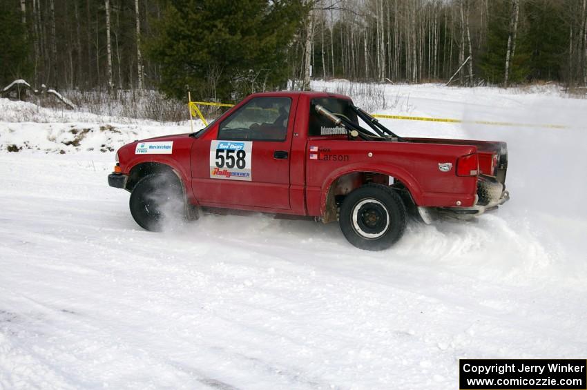 Jim Cox / Mark Larson Chevy S-10 powers out of a left-hander on the first stage of day two.