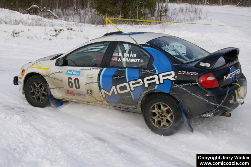 Bruce Davis / Jimmy Brandt Dodge SRT-4 power out of a left-hander on the first stage of day two.