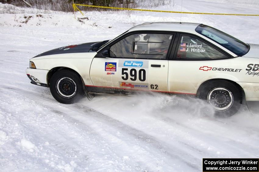 Joel Sanford / Jeff Hribar Chevy Cavalier drifts perfectly on a left-hander on the first stage of day two.