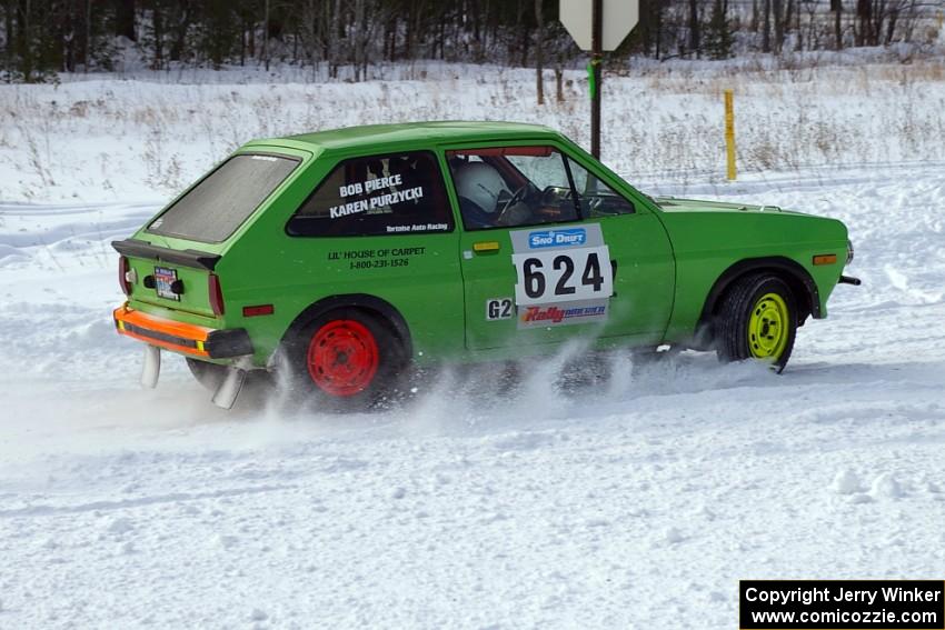 Karen Purzycki / Bob Pierce take a much easier approach to a slick corner in their Ford Fiesta.