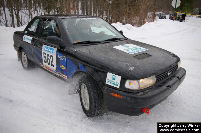 Brian Dondlinger / Dave Parps hug the inside of a bank on day two of the rally in their Nissan Sentra SE-R.