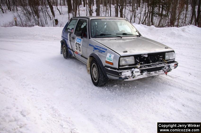 Russ Rosendale / Pete Oppelt VW Golf at a sharp 90-right on day two of the rally.