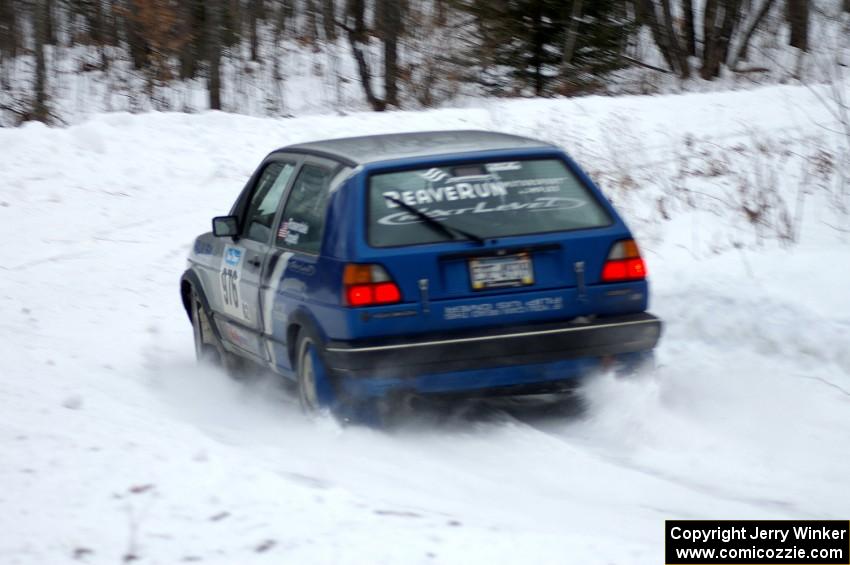 Russ Rosendale / Pete Oppelt VW Golf at a sharp hairpin right on day two of the rally.