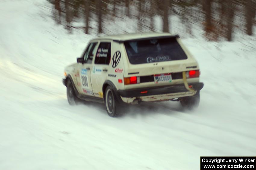 Brett Fairbanks / Chris Greenhouse VW Rabbit at speed on a late afternoon stage.
