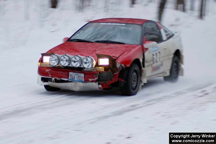 Marcin Kowalski / Marek Cichocki on a straight at dusk in their Mitsubishi Eclipse.