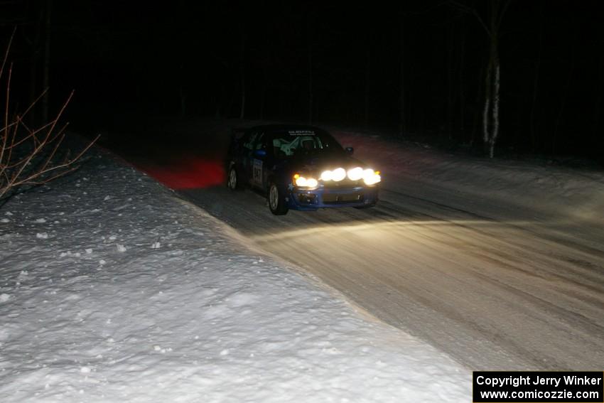 William Bacon / Peter Watt	 at speed at the flying finish of the penultimate stage in their Subaru WRX STi.